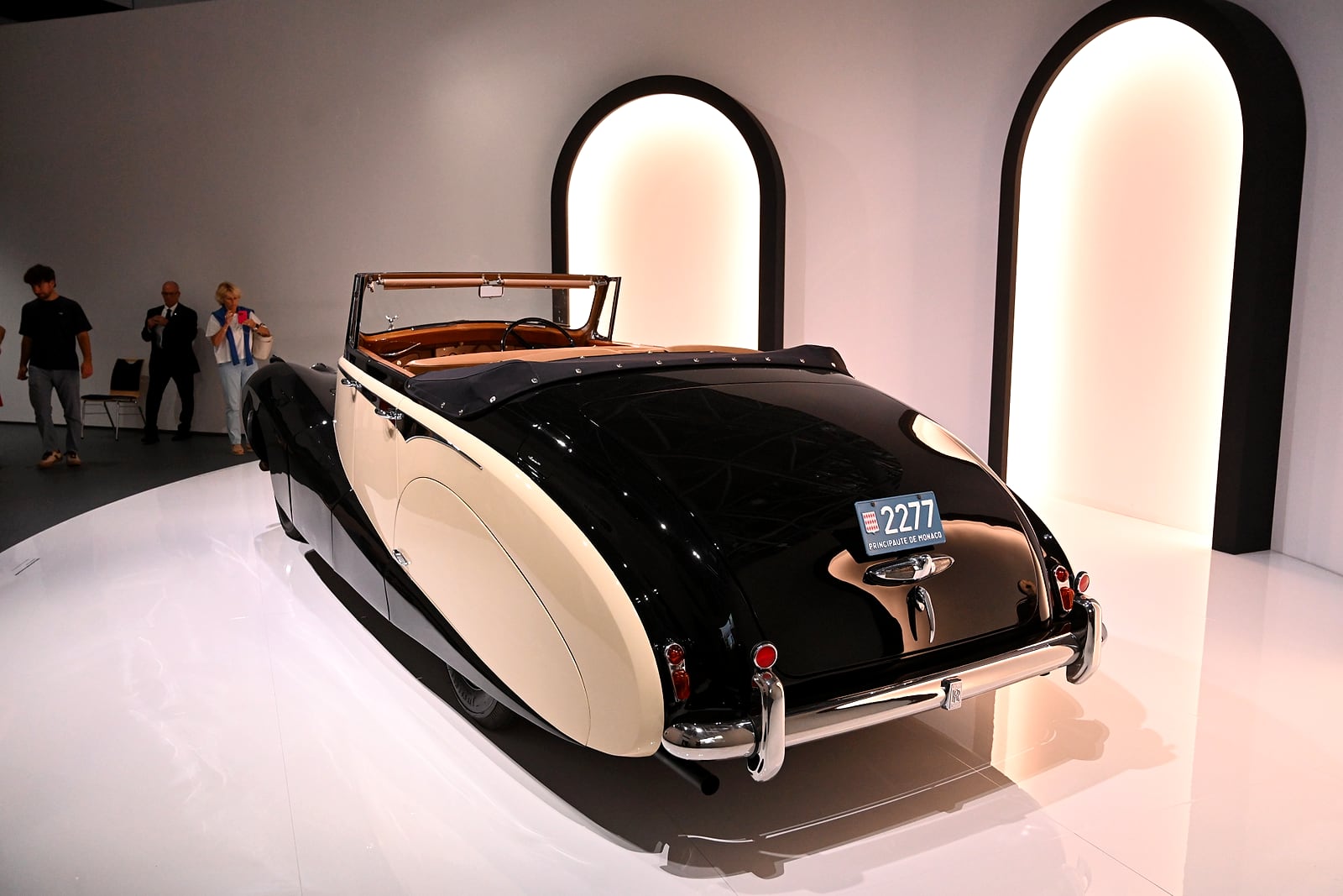 Elegant black vintage convertible with cream leather interior