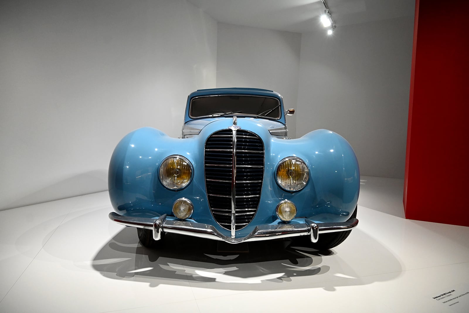 Sweeping blue vintage coupe, front three-quarter