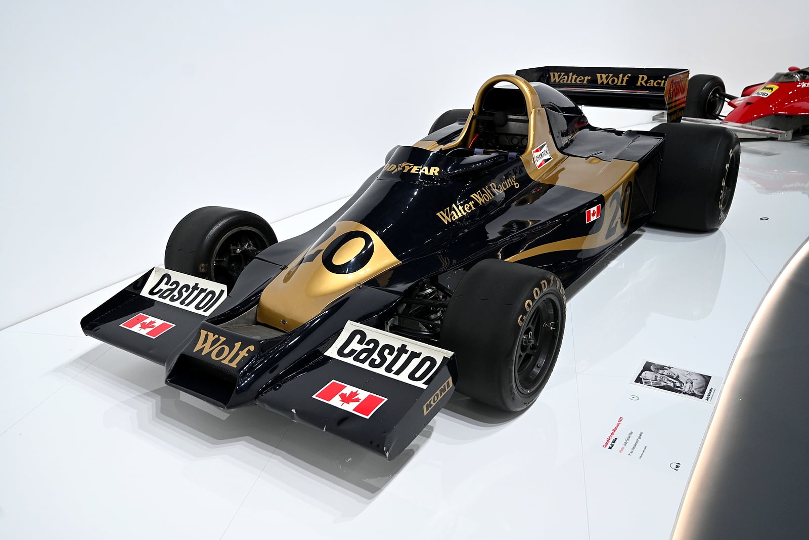 Black and gold Walter Wolf Racing Formula 1 car, side profile